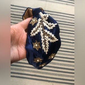Beaded head band.